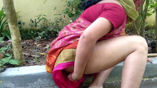 stepmom caught pissing outdoors adjacent to a public backyard