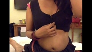 Hot Desi Bhabhi Showing Big Boobs n Putting in Condom on Dick