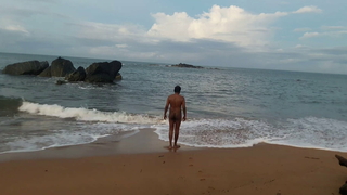 Indian twink nude in the air public on the beach