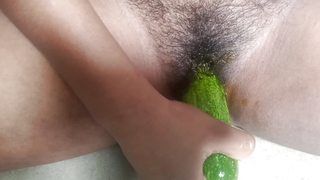 Whole CUCUMBER close to My DARK pussy . Attracting A Giant Cucumber close to my pussy .  Gender with cucumber . Painful copulation video.