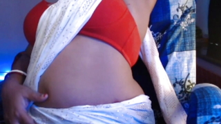 Low-spirited girl strips her brassiere with an increment of presses her boobs in saree.